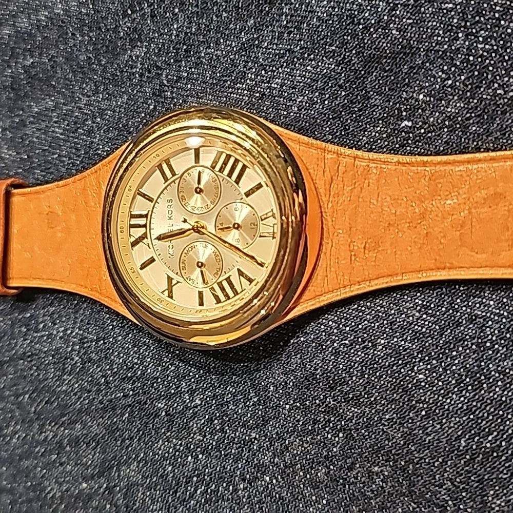 Michael Kors gold tone watch with tan leather band